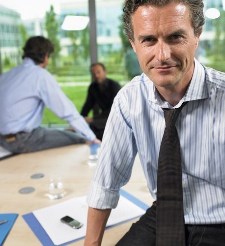 Business man looking at camera Business man looking at camera